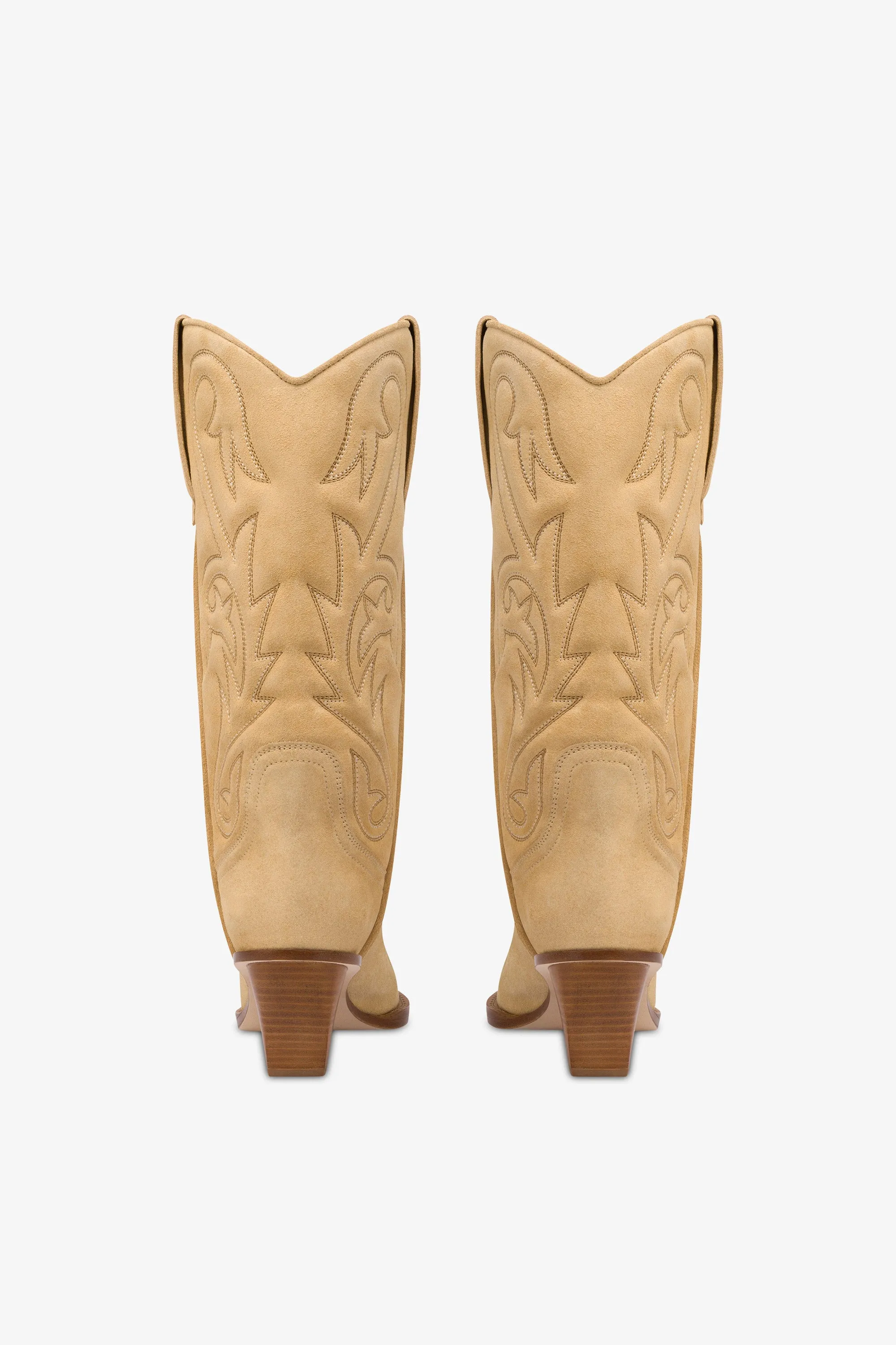 Boots in ecru suede leather
