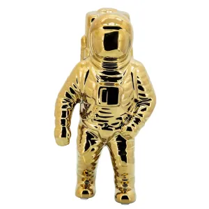 GOLD ASTRONAUT STATUE