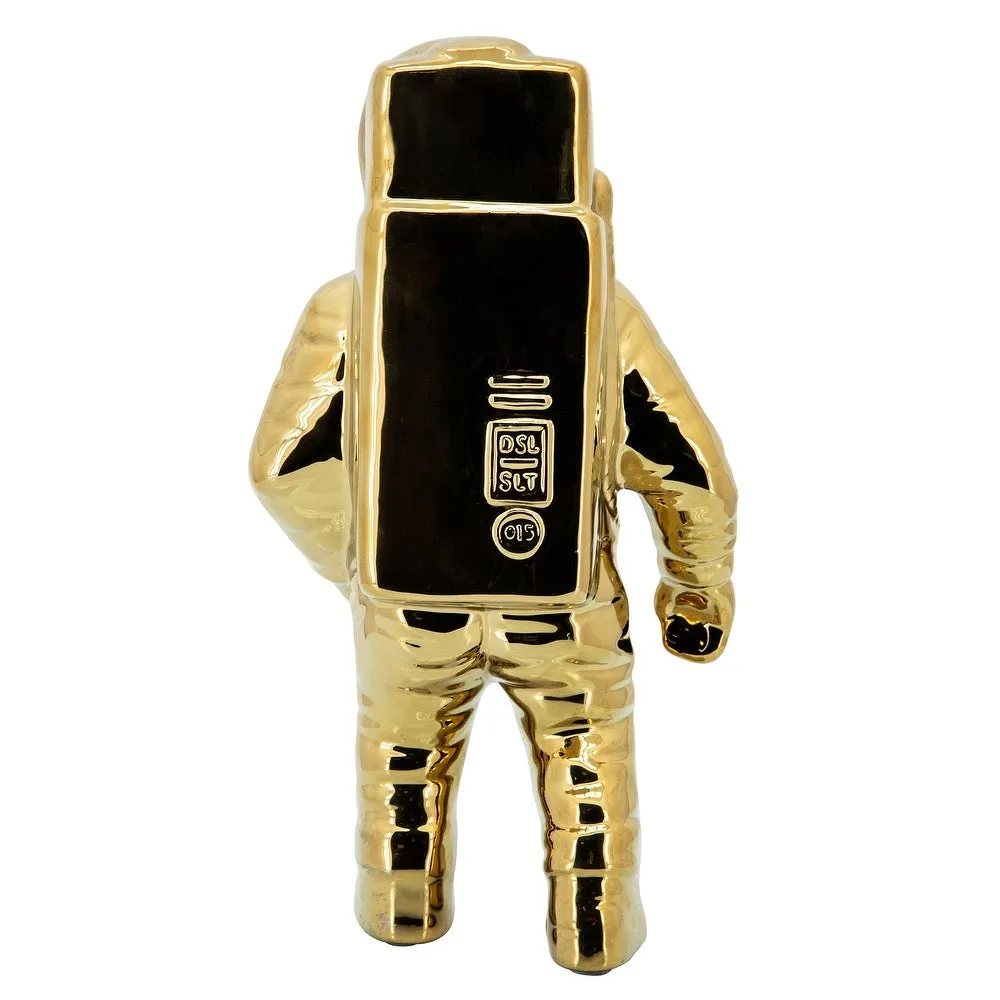 GOLD ASTRONAUT STATUE